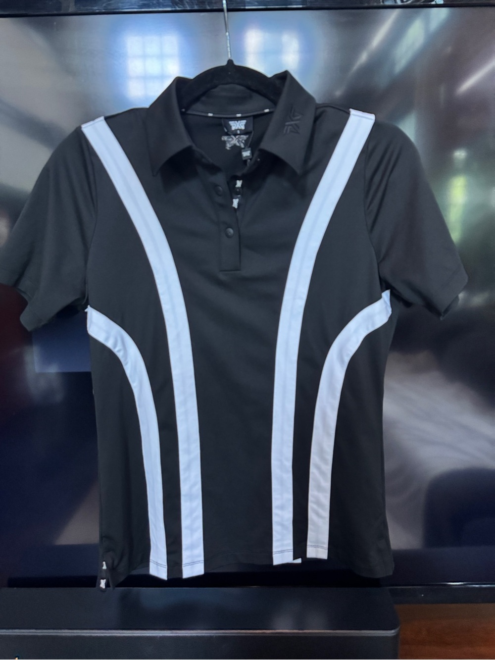 PXG Black Polo with White Curved Stripe Design